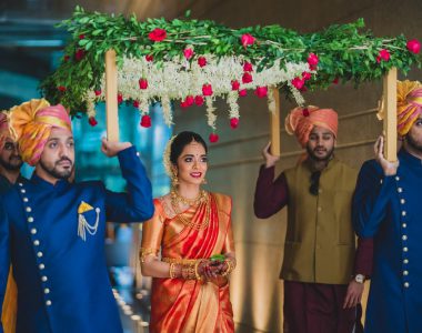 bride-bridal-entrance-phoolon-ki-chadaar-the-bride-entering-under-a-phoolon-ki-chadaar