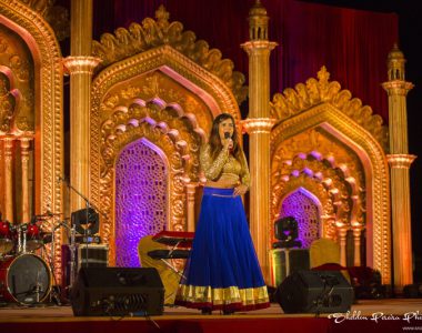 glitter-golden-full-sleved-choil-along-with-sea-blue-lehenga-featuring-golden-and-maroon-border